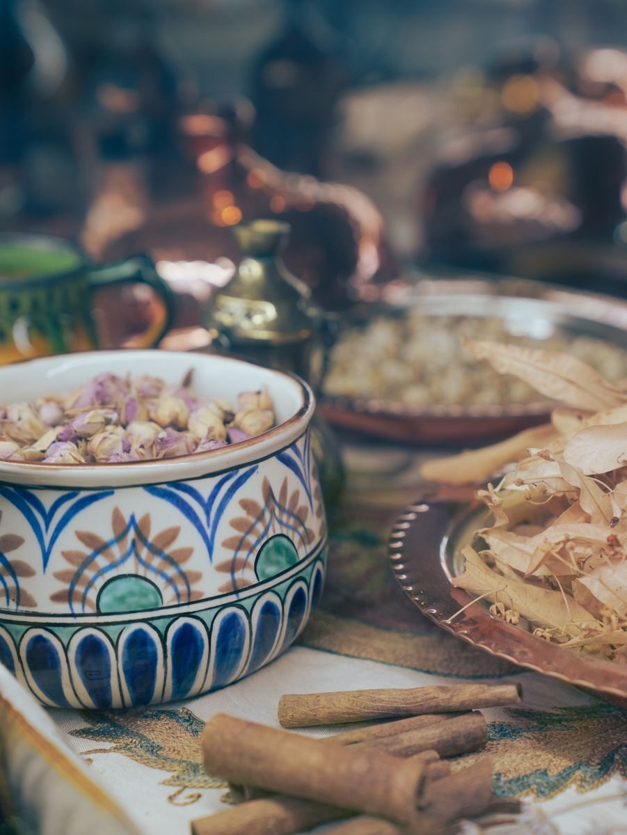 Authentic Turkish tea setup with herbs and spices in Bursa, Turkey. A warm cultural scene.
